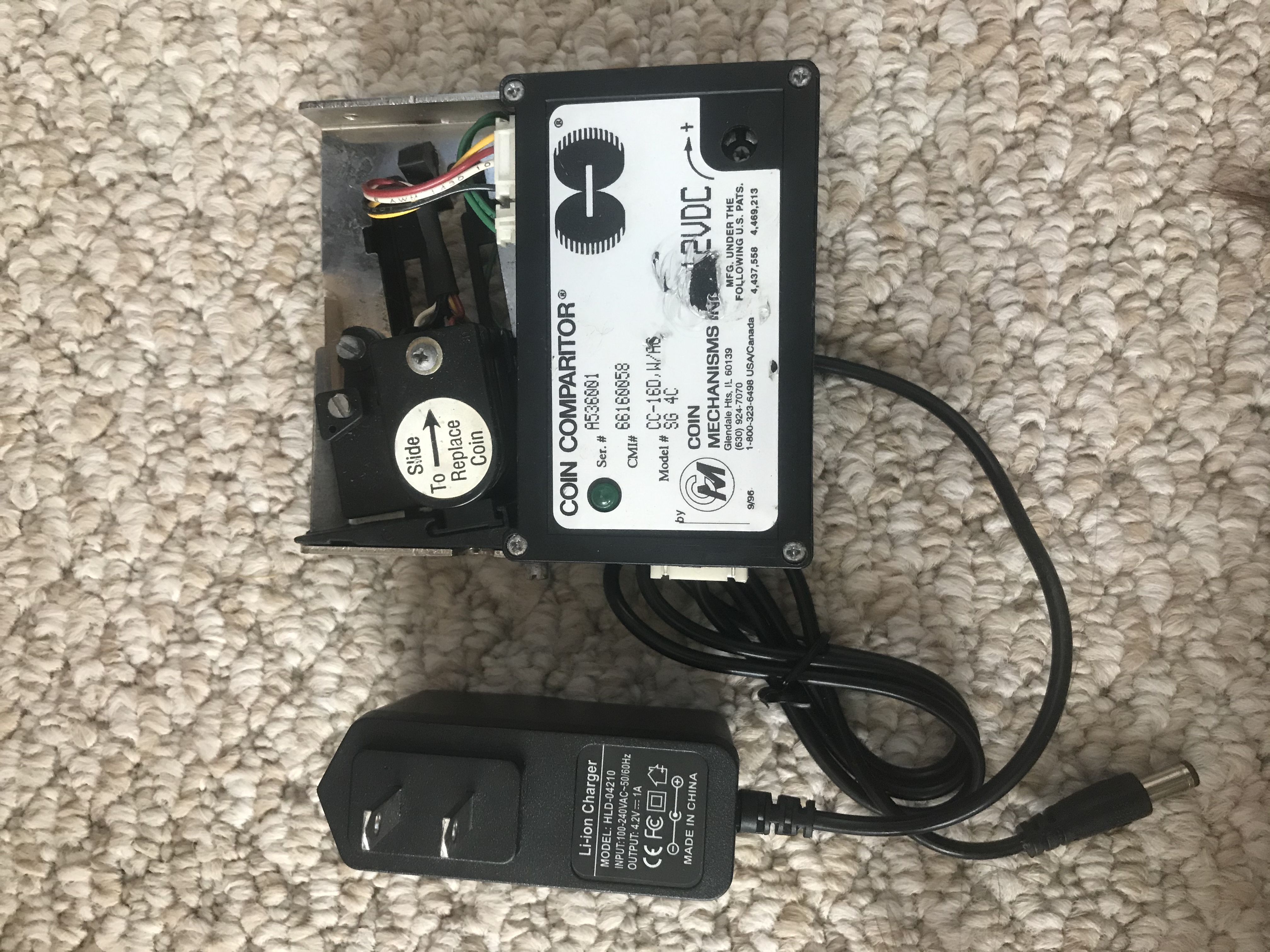 Used     Fi-ion Charger and Coin Comparitor Set