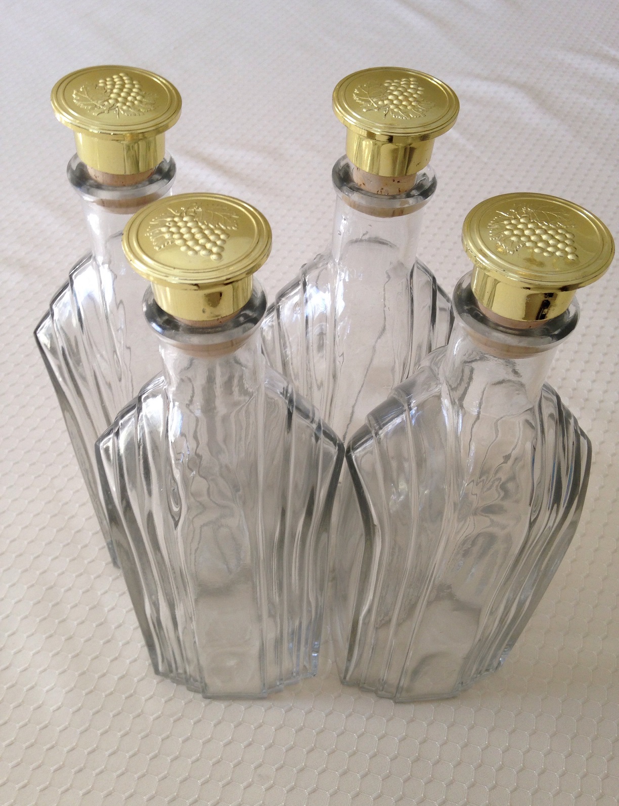 Like New     4 Curbed Glass Bottles with Cork Tops